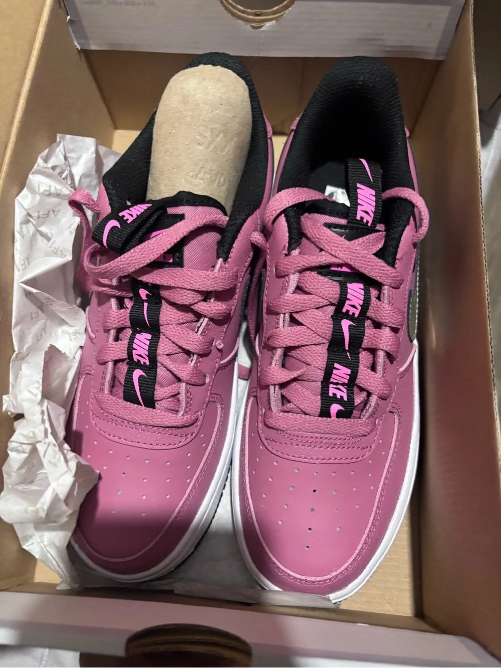 Nike Pink and Black Low-Top Sneakers